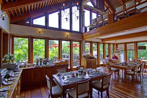 Breakfast, lunch, dinner served; international cuisine, pool views 