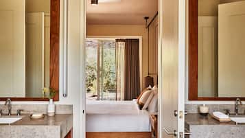 Designer toiletries, hair dryer, bathrobes, slippers