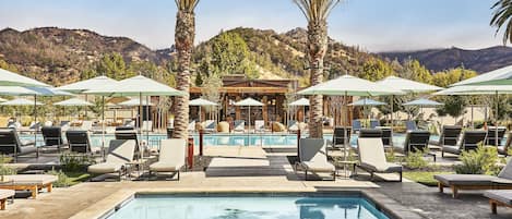 6 outdoor pools, cabanas (surcharge), pool umbrellas