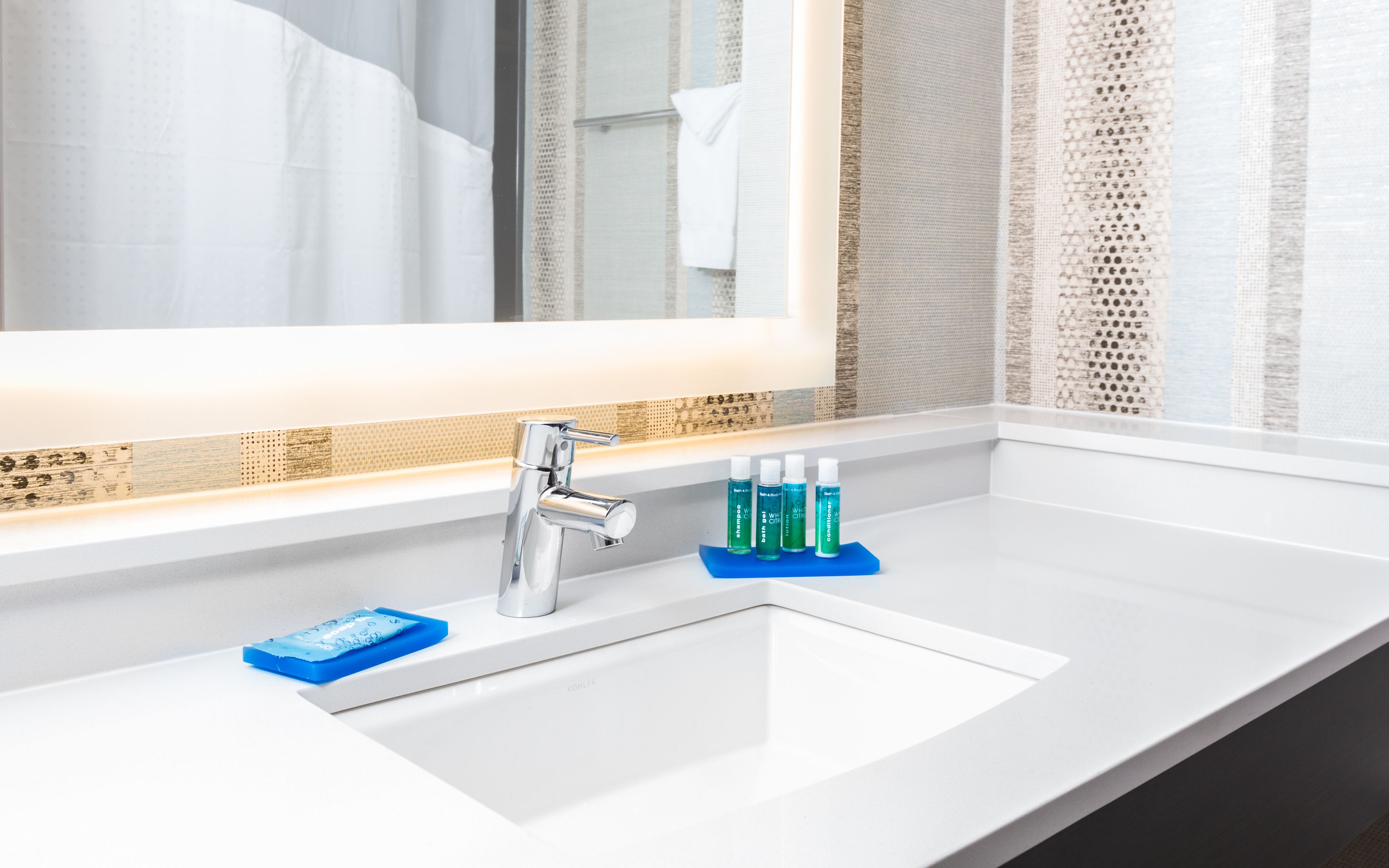 Eco-friendly toiletries, hair dryer, towels