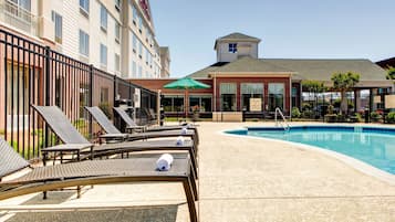 Outdoor pool, pool umbrellas, sun loungers