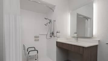 Pomme de douche hydromassante, séchoir à cheveux, serviettes fournies