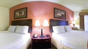 Desk, laptop workspace, iron/ironing board, free cribs/infant beds