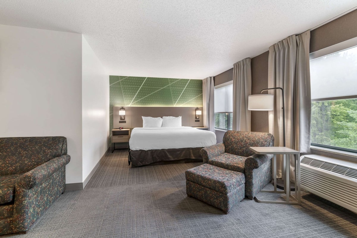 Luxe beddengoed, pillowtop-bedden, een kluis op de kamer, een bureau