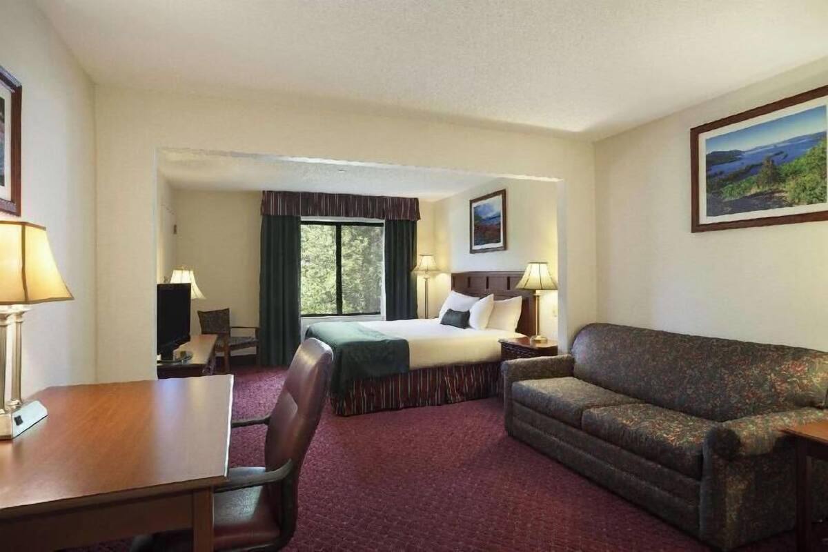 Premium bedding, down comforters, pillowtop beds, in-room safe