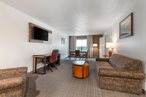 Suite, 1 King Bed with Sofa bed | Premium bedding, down comforters, pillowtop beds, in-room safe
