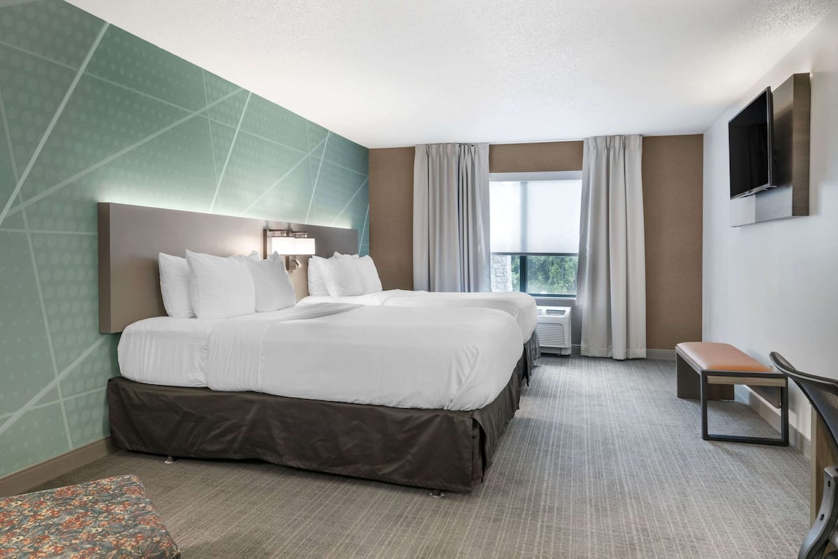 Luxe beddengoed, pillowtop-bedden, een kluis op de kamer, een bureau