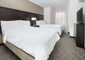 Premium bedding, pillowtop beds, desk, laptop workspace