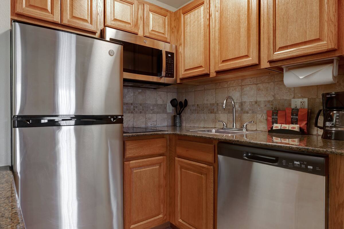 hypo-allergenic bedding, down duvets, in-room safe, desk