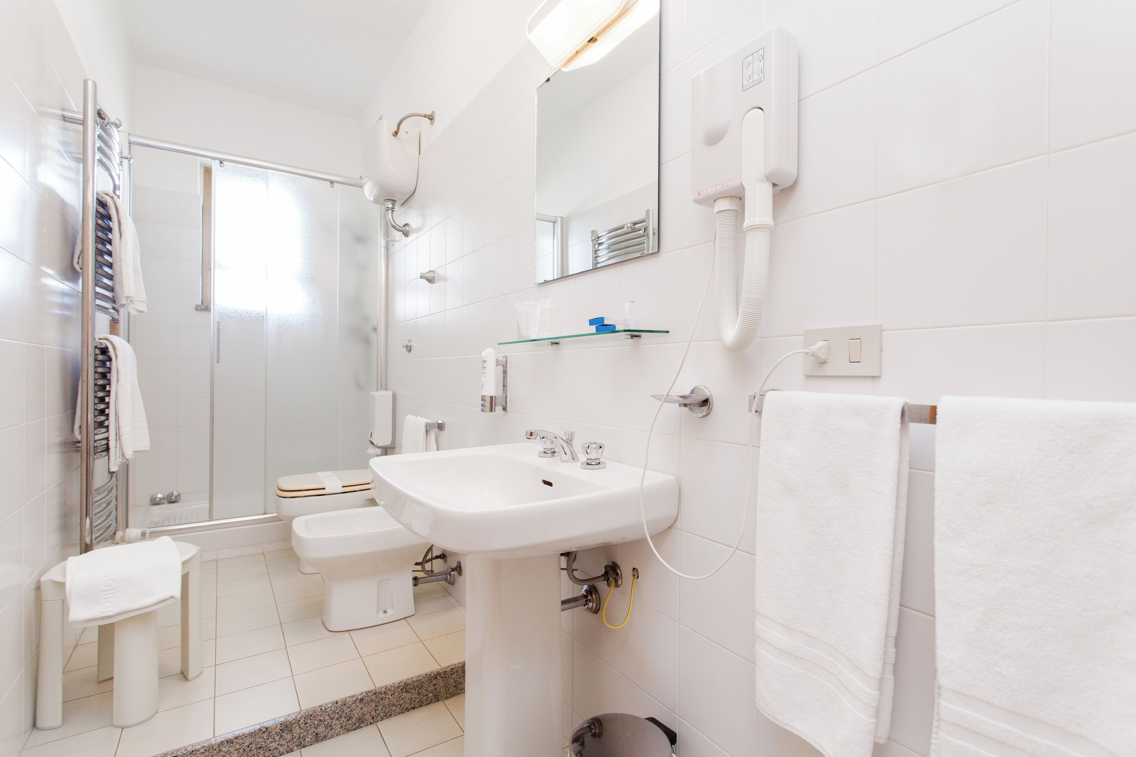 economy room, 1 queen bed, private bathroom, mountain view | minibar, in-room safe, desk, soundproofing