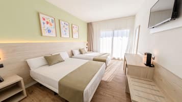 Lakens van Egyptisch katoen, luxe beddengoed, een minibar, een bureau