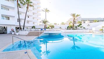 Outdoor pool, open 10:00 AM to 6:00 PM, pool umbrellas, pool loungers