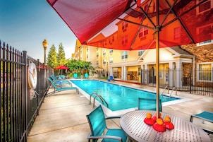 Outdoor pool, open noon to 9:00 PM, pool umbrellas, sun loungers