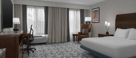Hypo-allergenic bedding, down duvets, in-room safe, desk