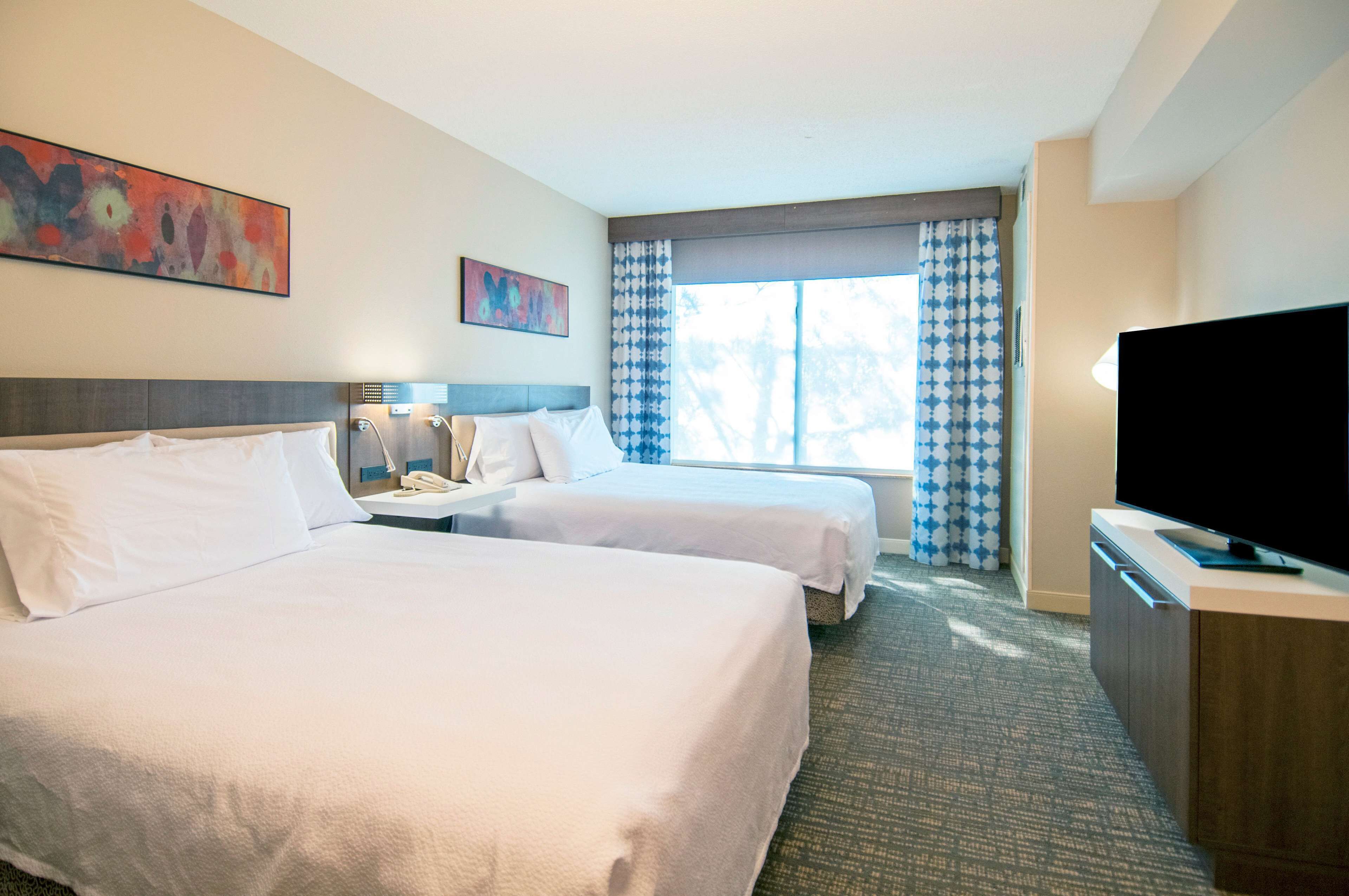 one bedroom suite, two queen beds | premium bedding, in-room safe, desk, iron/ironing board