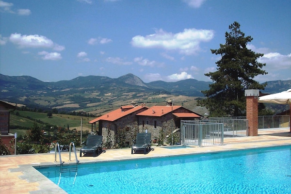 Seasonal outdoor pool, open 8:00 AM to 7:00 PM, pool umbrellas