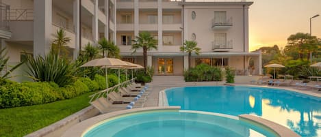 Outdoor pool, pool umbrellas, pool loungers