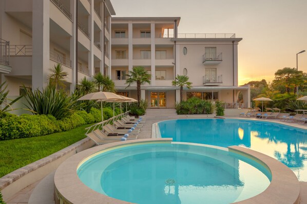 Outdoor pool, pool umbrellas, pool loungers