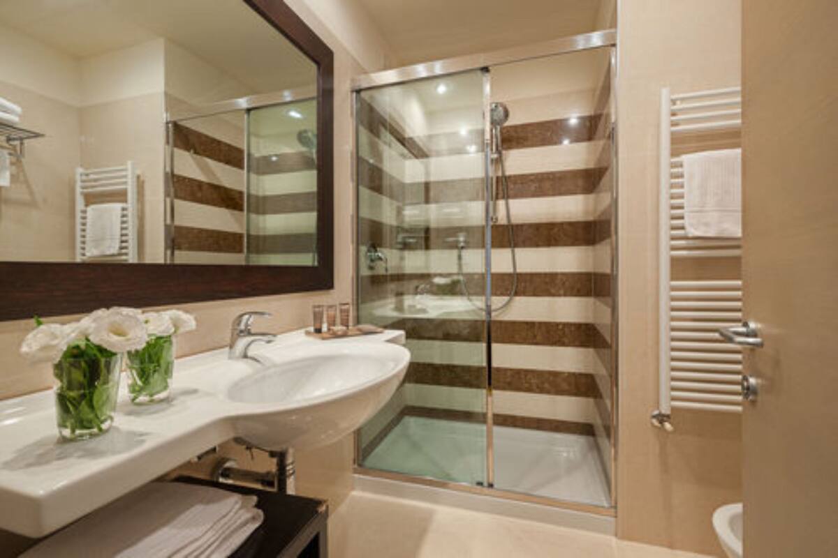 shower, free toiletries, hair dryer, slippers