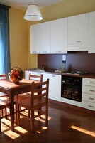 Standard Room | Private kitchen | Mini-fridge, stovetop, coffee/tea maker, cookware/dishes/utensils
