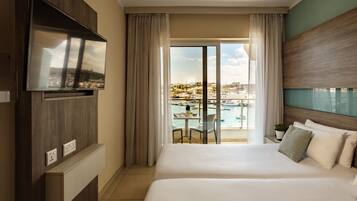 Standard Double or Twin Room, Sea View | Minibar, in-room safe, desk, laptop workspace