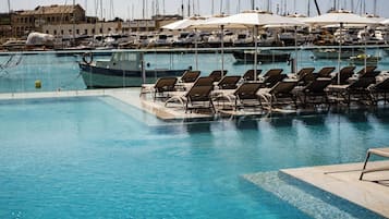 Indoor pool, outdoor pool, open 9:00 AM to 6:00 PM, pool umbrellas