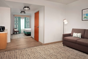 Suite, 1 chambre | Coin séjour