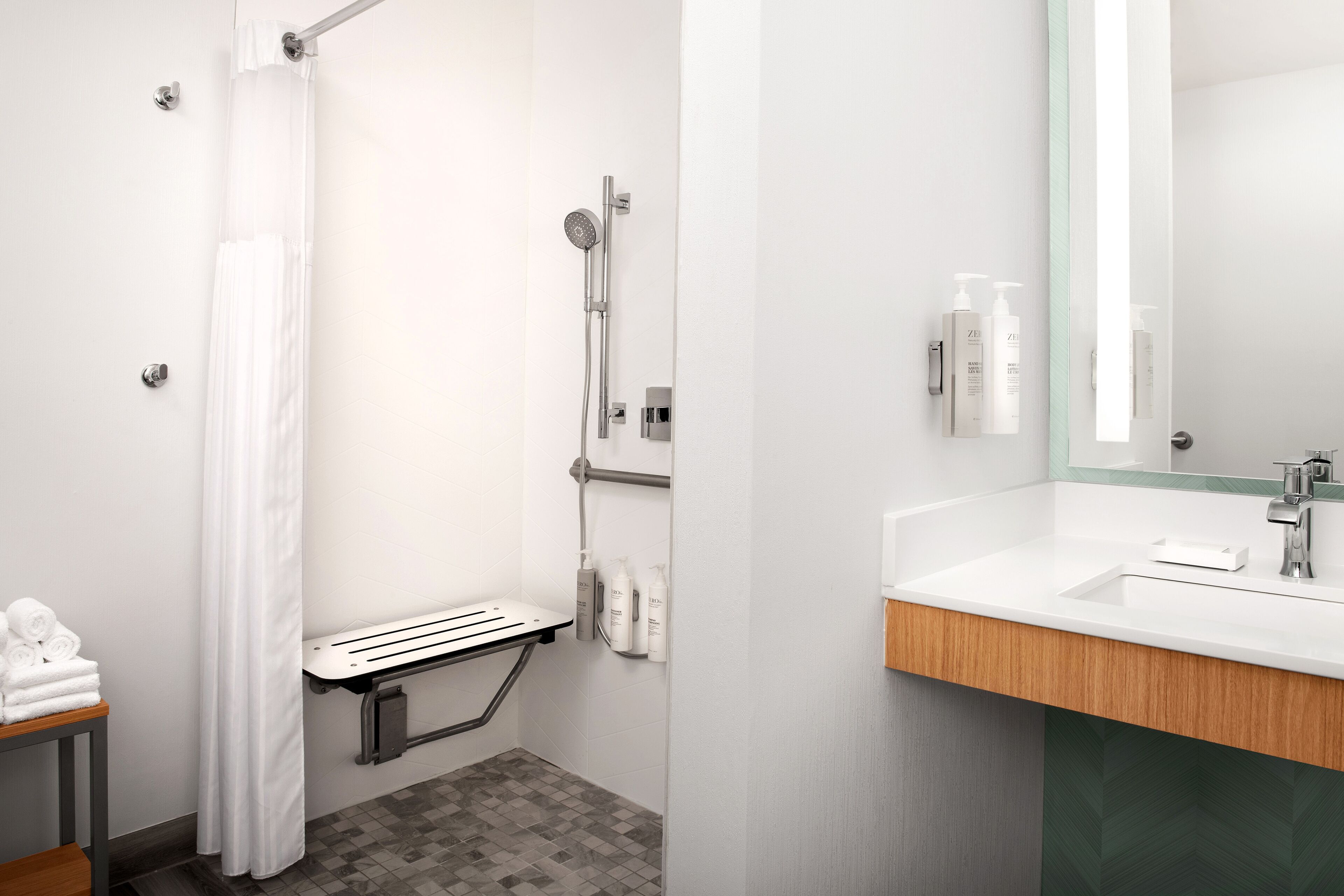 combined shower/bathtub, free toiletries, hair dryer, towels