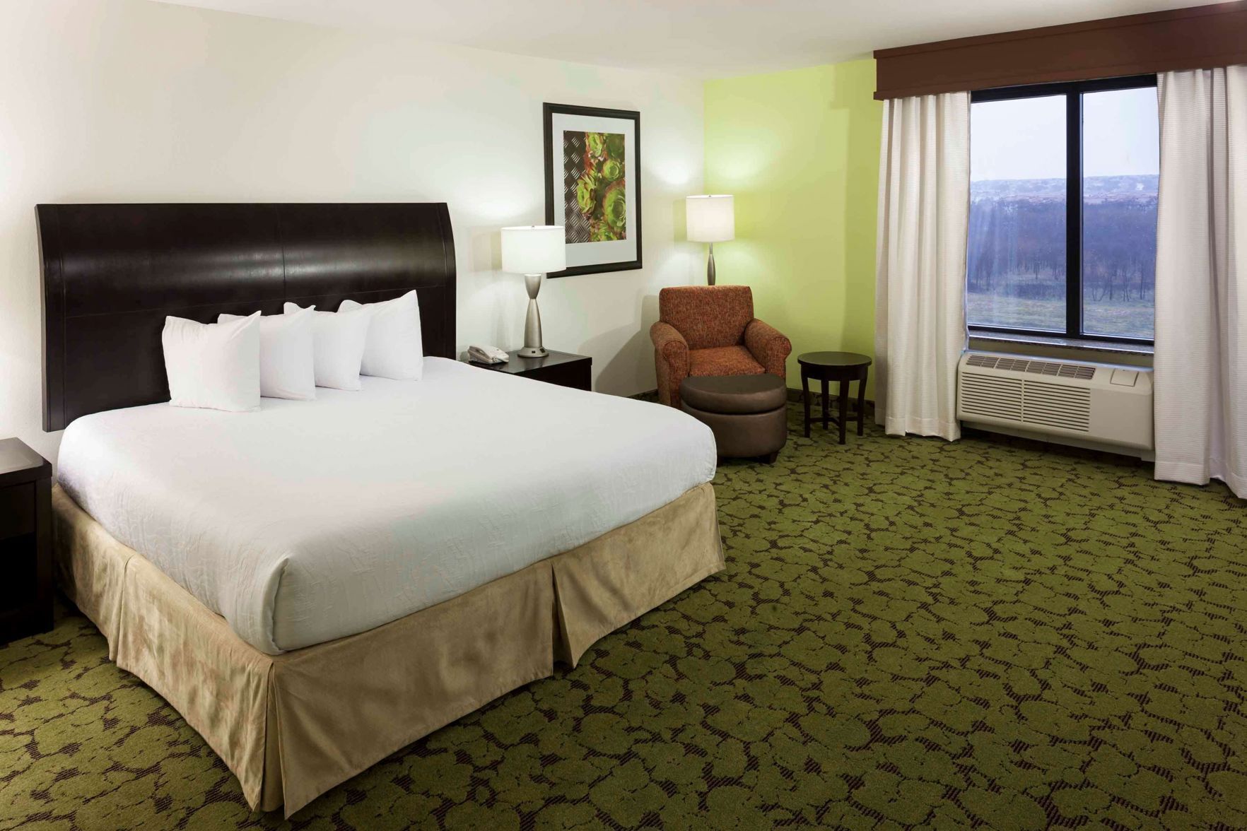 Premium bedding, desk, laptop workspace, iron/ironing board