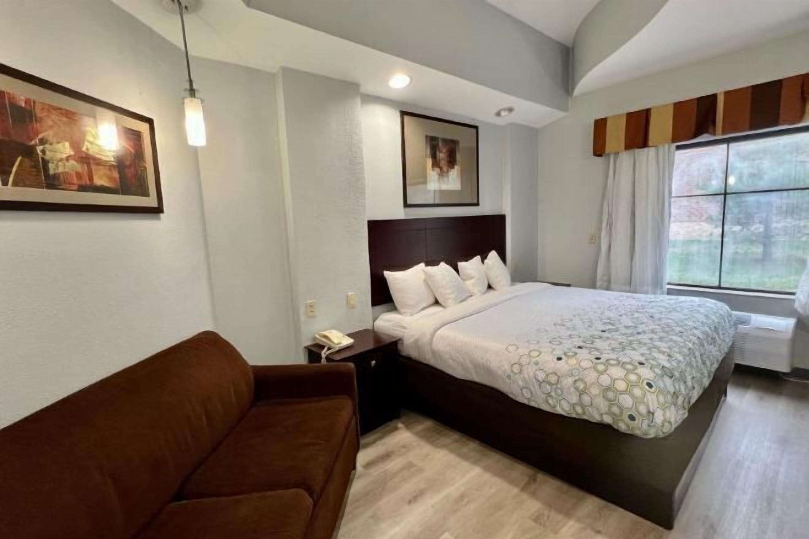 Desk, laptop workspace, blackout curtains, iron/ironing board