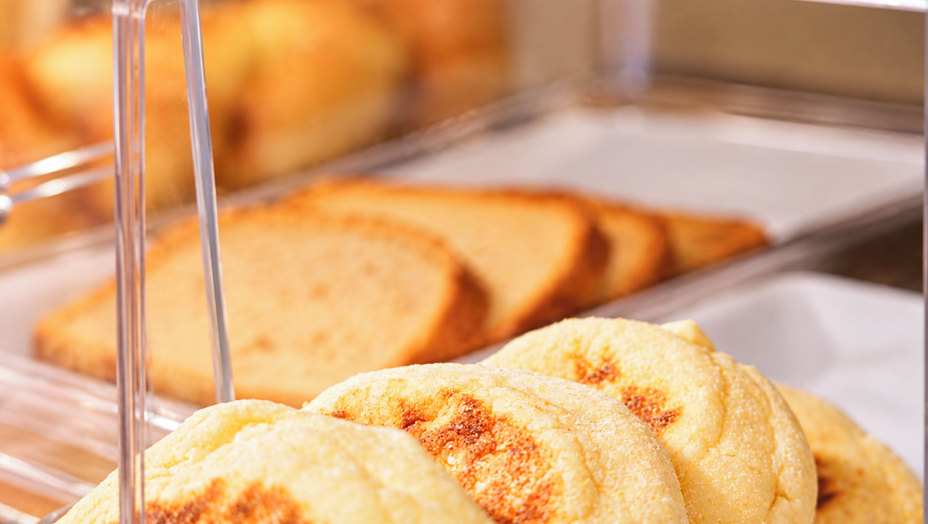 A display of baked goods in a bakery setting.