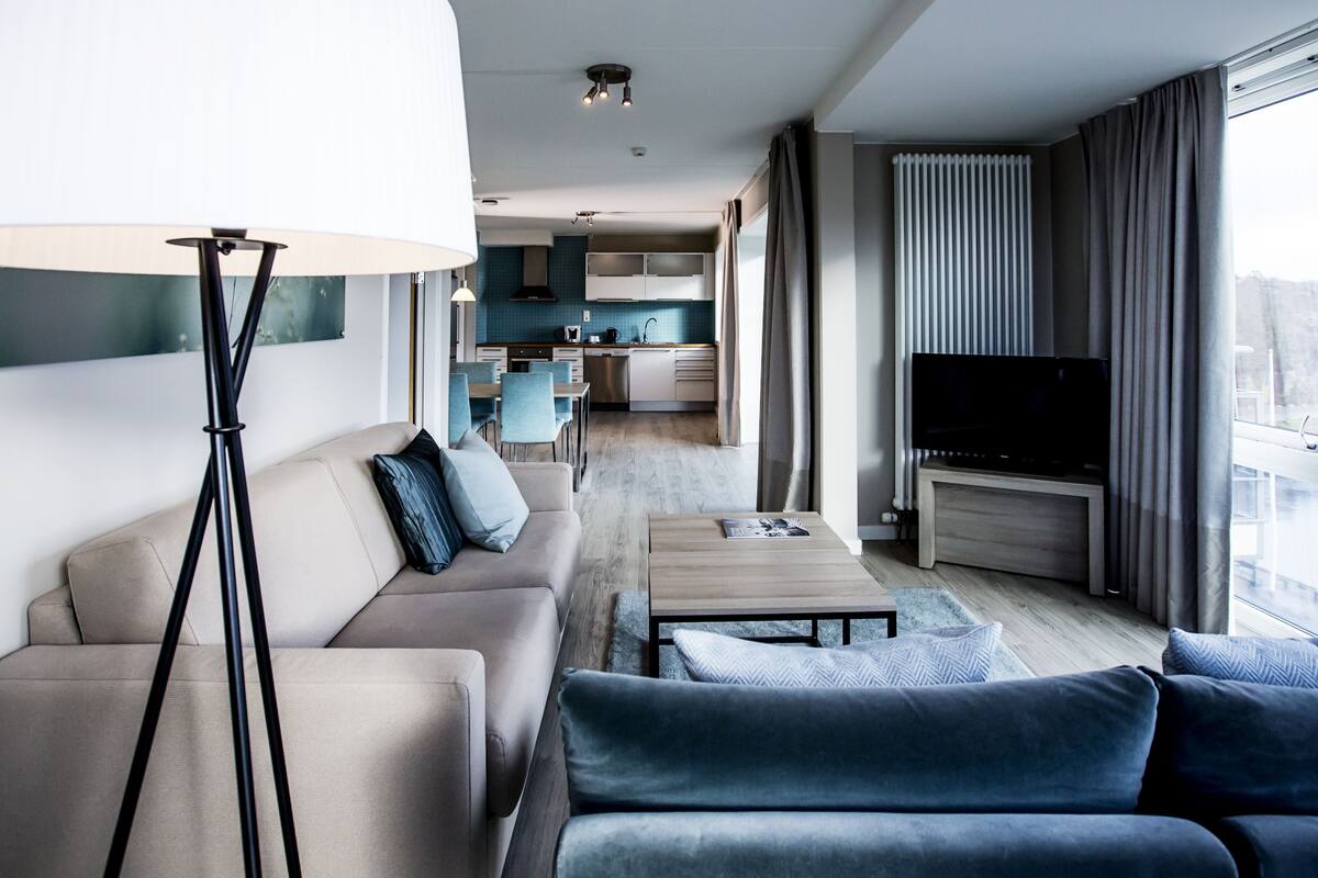 suite (front) | living area | 32-inch led tv with cable channels, tv