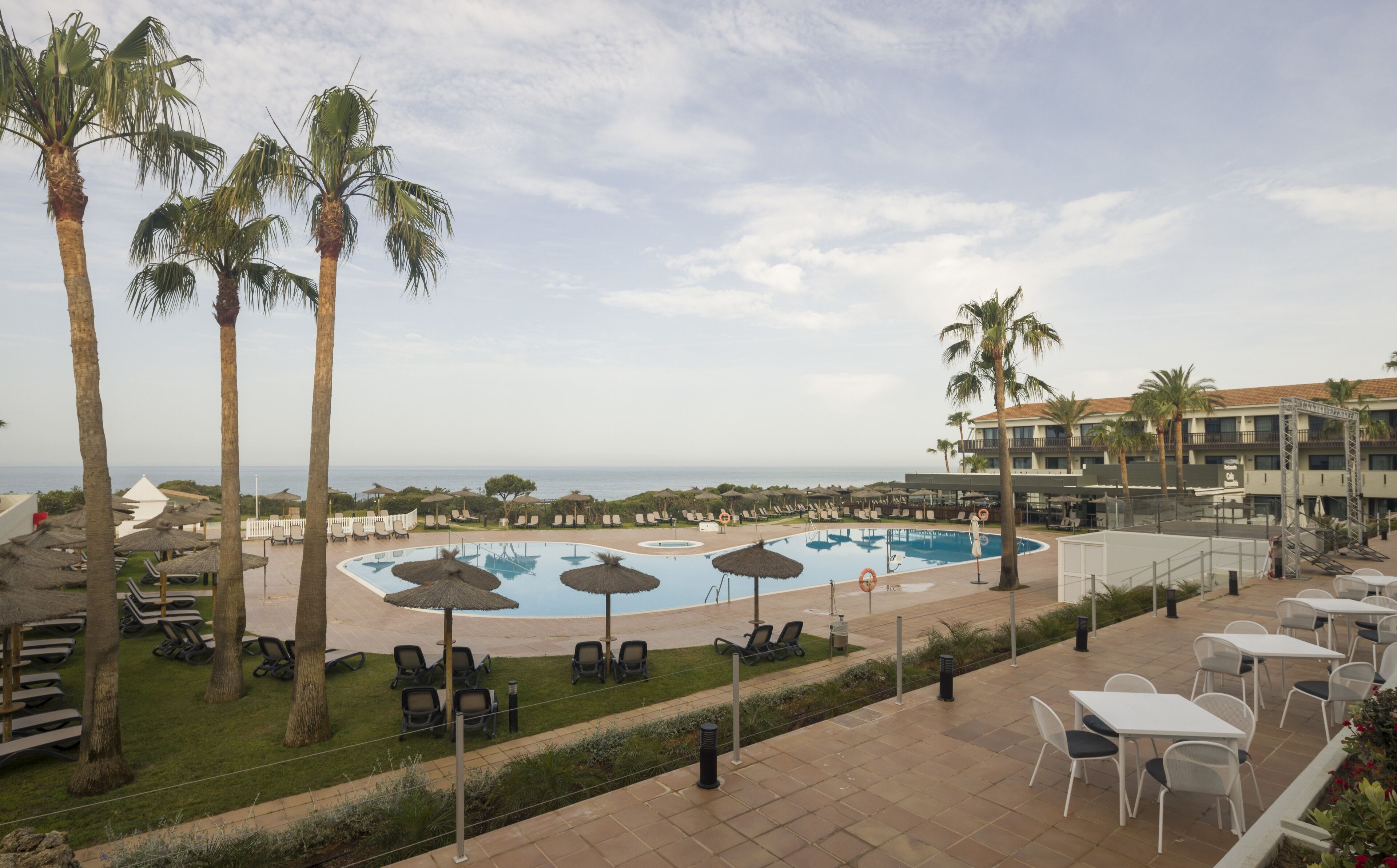 indoor pool, seasonal outdoor pool, pool umbrellas, pool loungers