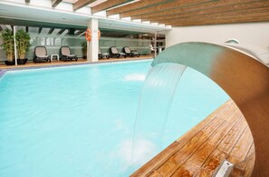 Indoor pool, seasonal outdoor pool, pool umbrellas, pool loungers