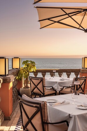 Breakfast, brunch served; local and international cuisine, pool views 