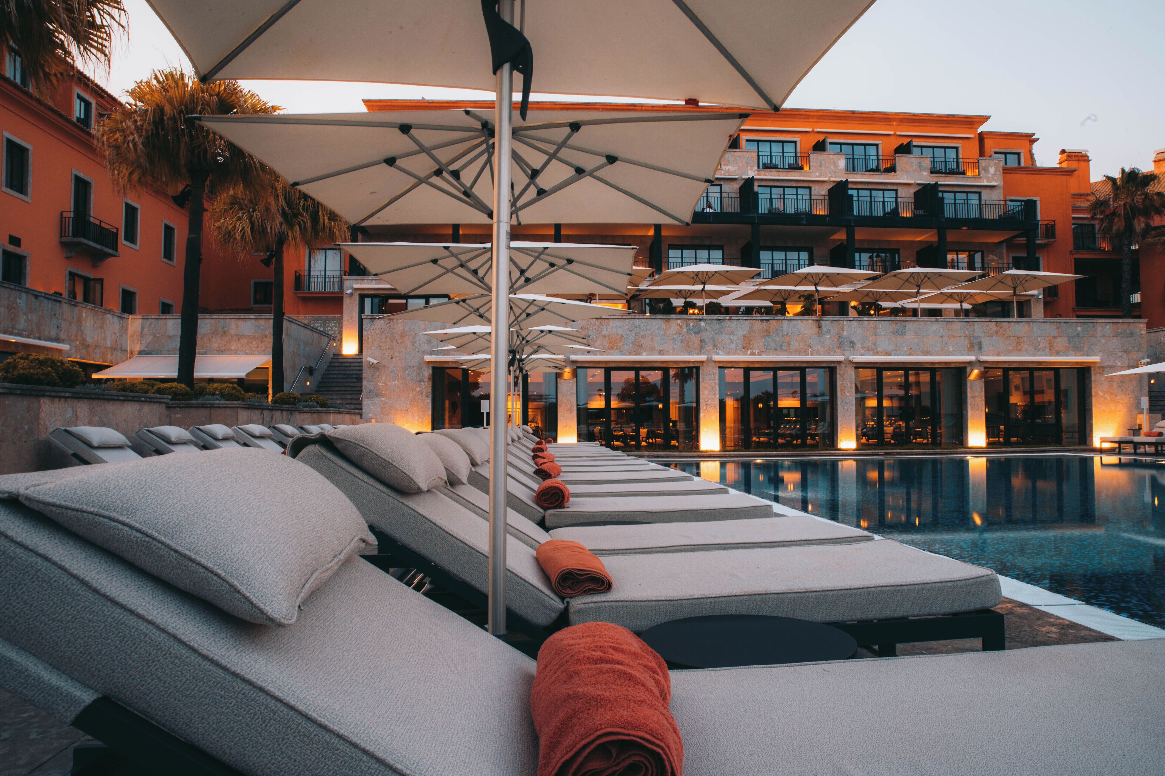 outdoor pool, pool umbrellas, pool loungers