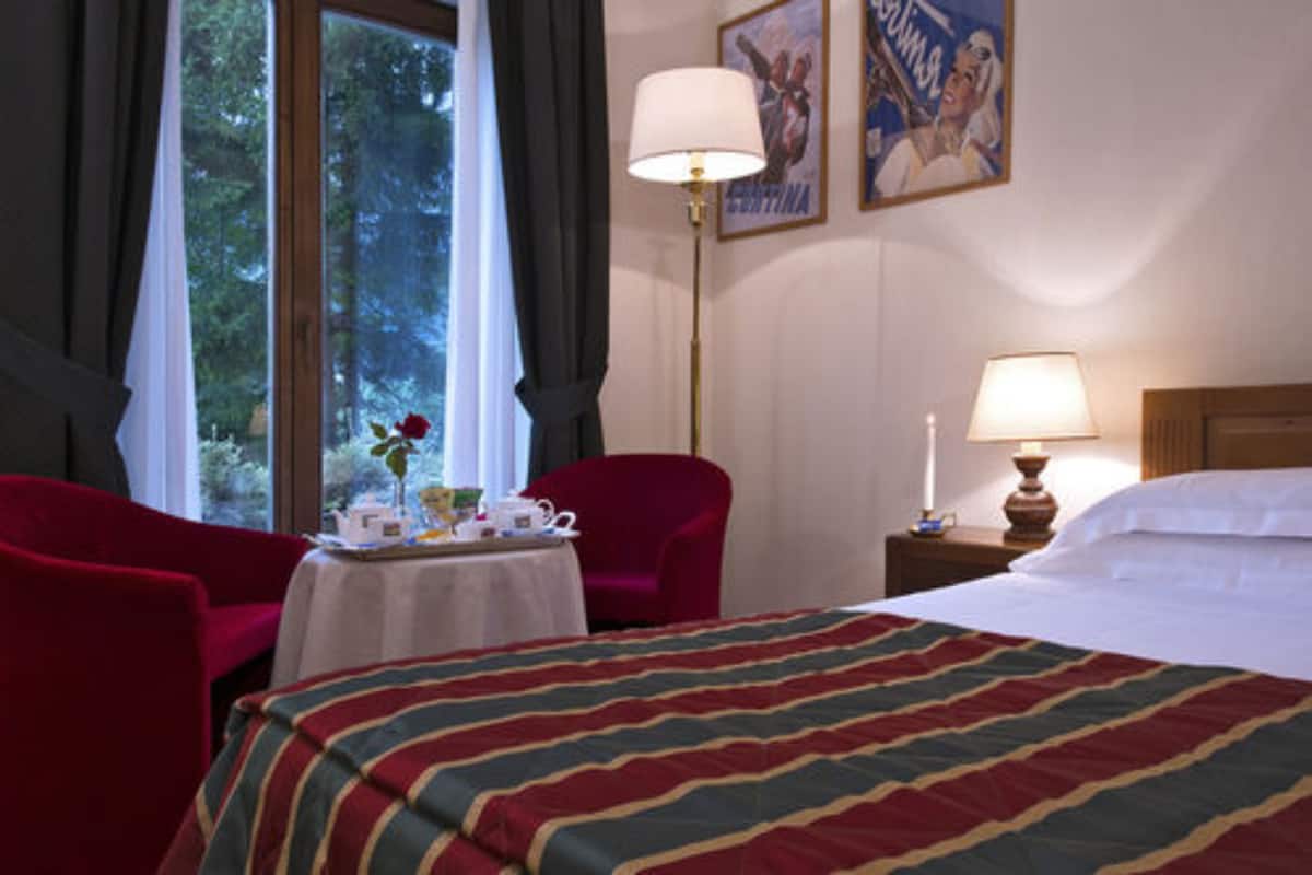 Down duvets, pillow-top beds, minibar, in-room safe