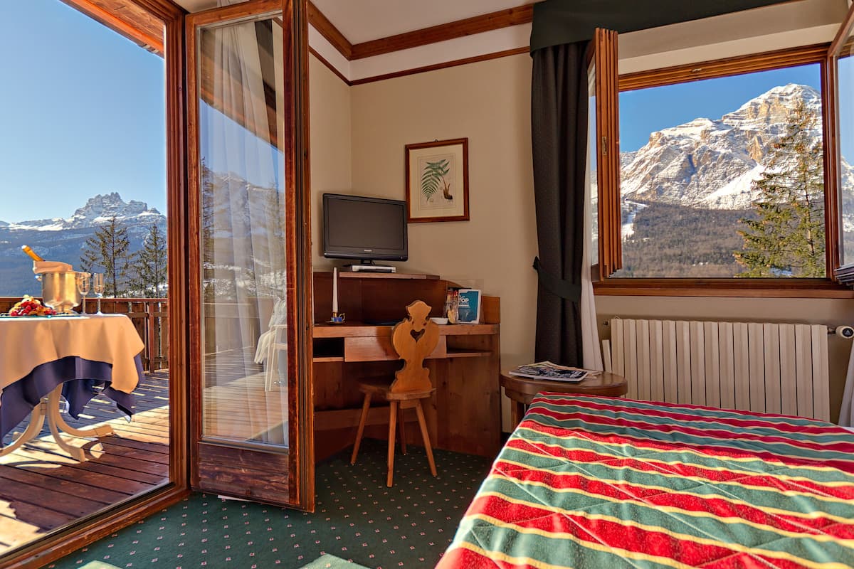 down duvets, pillow-top beds, minibar, in-room safe