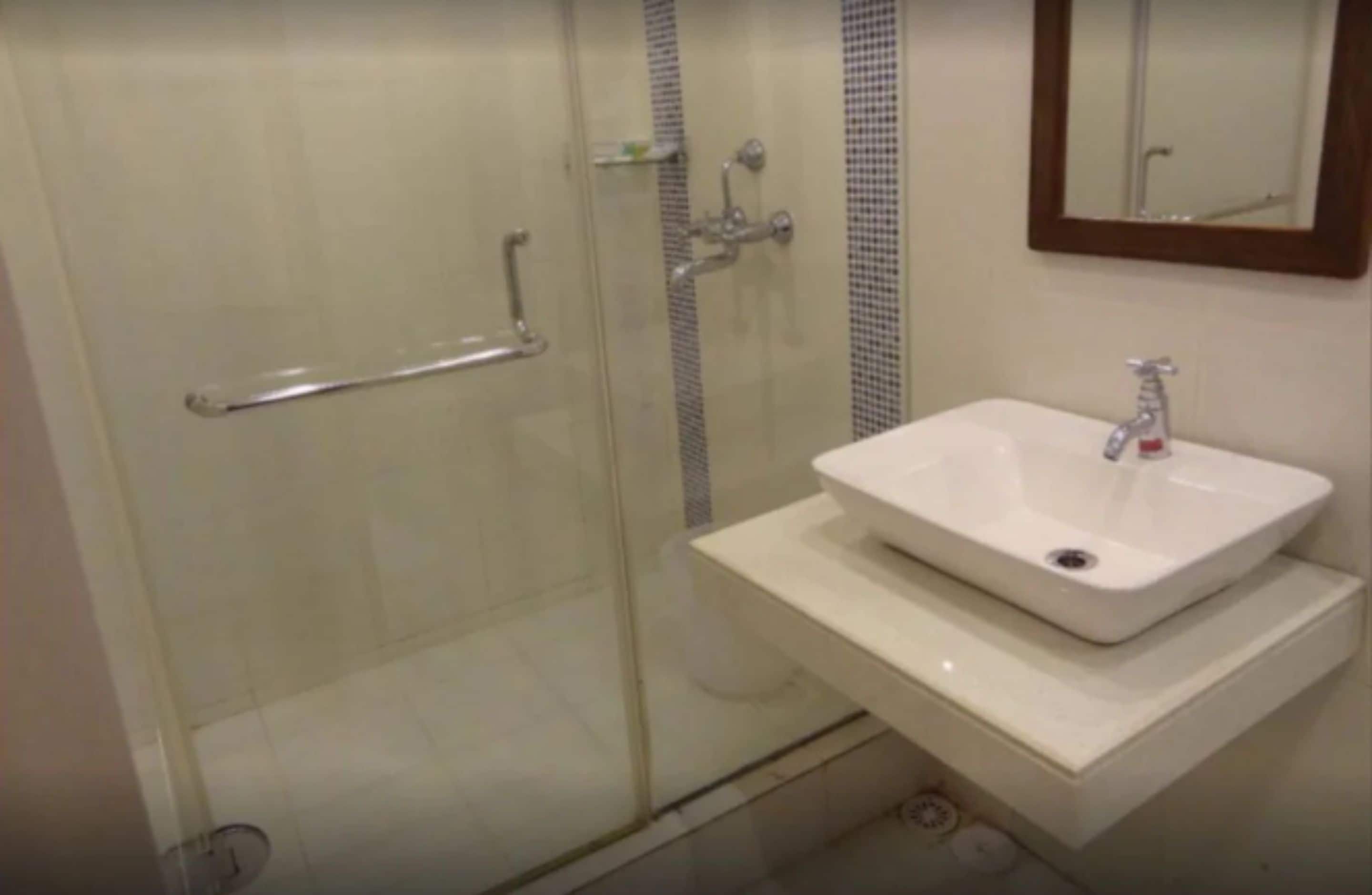 shower, rainfall showerhead, designer toiletries, towels