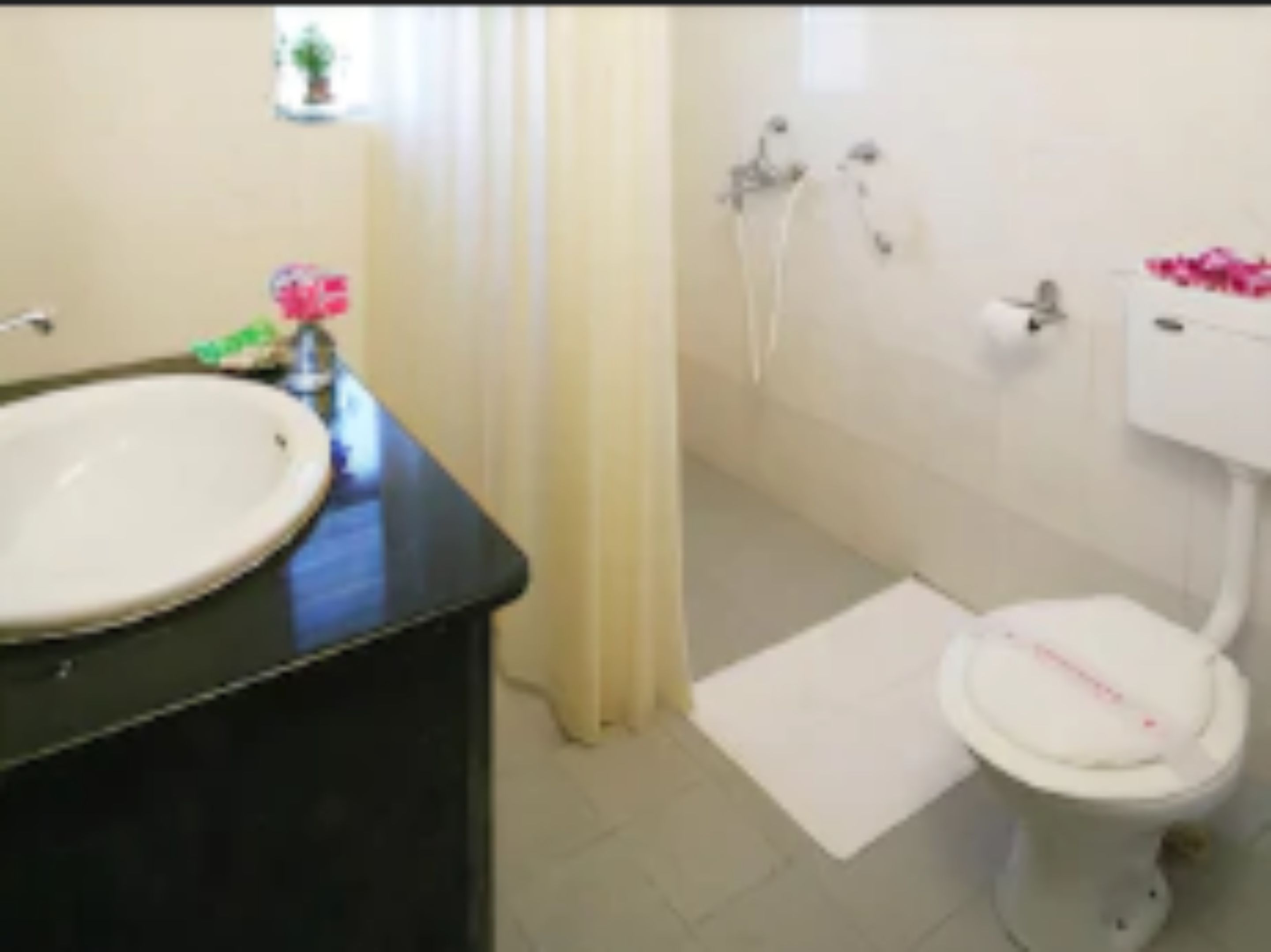 shower, rainfall showerhead, designer toiletries, towels