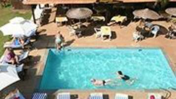 2 outdoor pools, open 8:30 AM to 6:00 PM, pool umbrellas, pool loungers