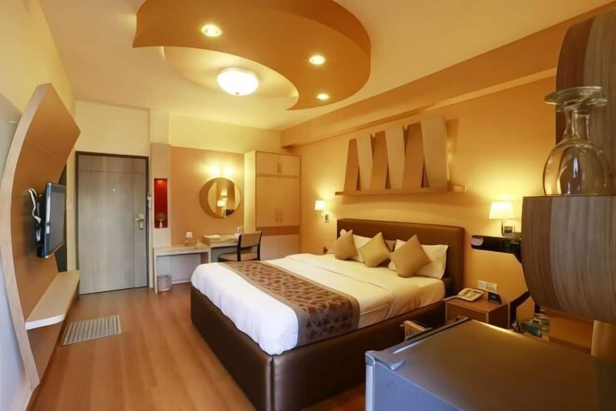 Sengetøy av topp kvalitet, memory foam-senger, minibar og safe på rommet