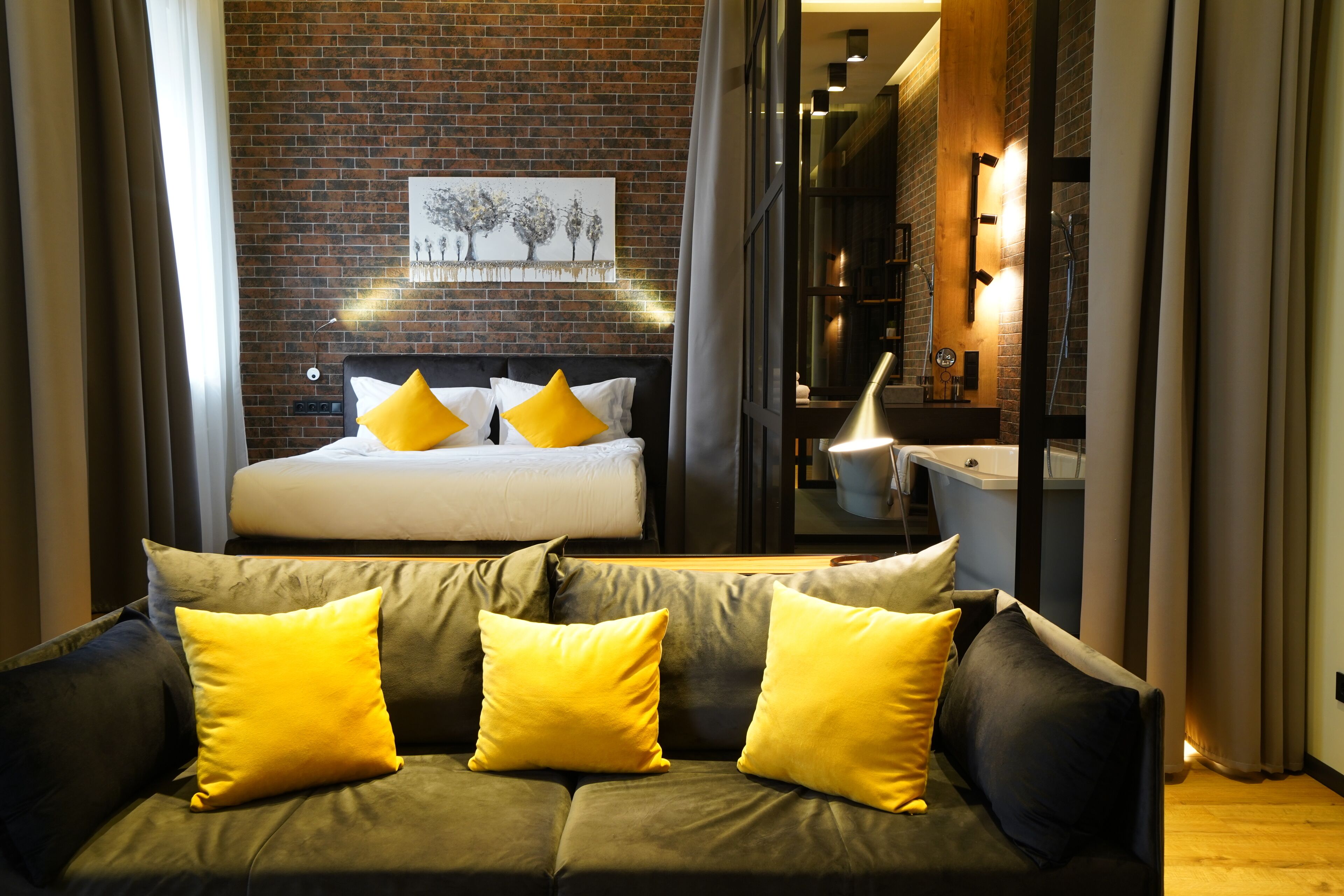 Suíte, 1 quarto | Roupas de cama premium, frigobar, individualmente decorados