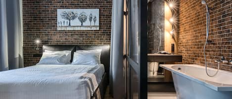 Suite, 1 slaapkamer | Luxe beddengoed, een minibar, individueel gedecoreerd