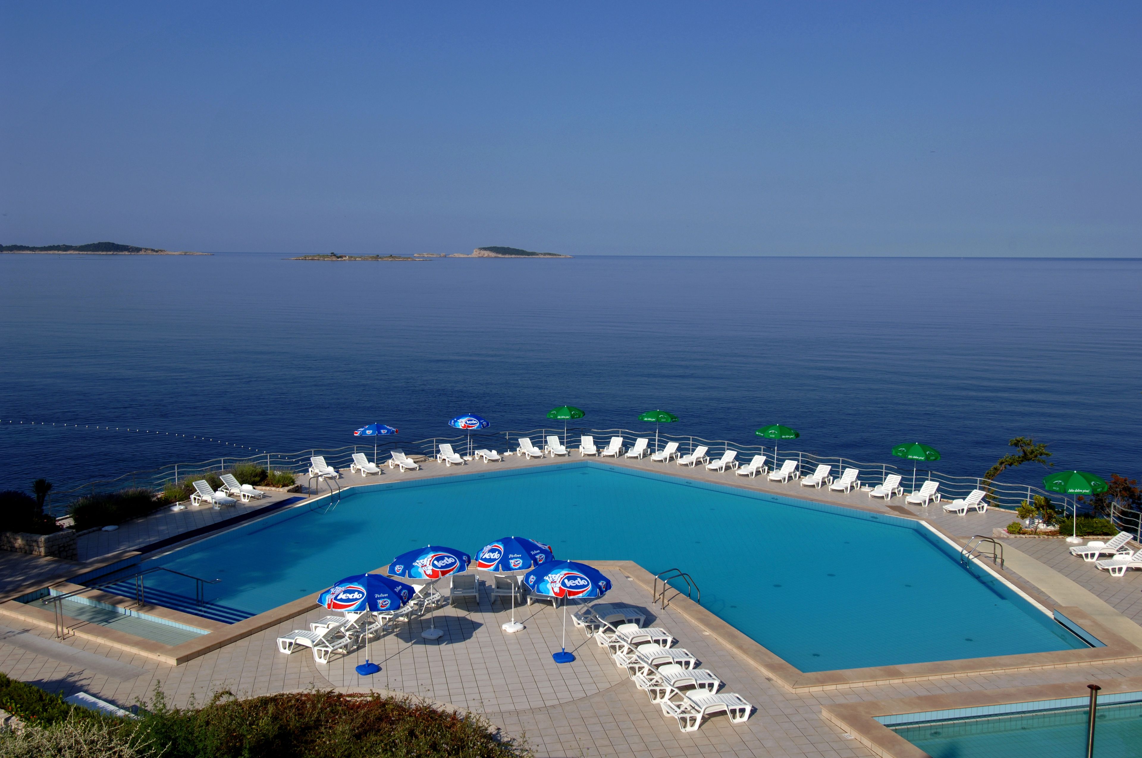 Outdoor pool, pool umbrellas, pool loungers