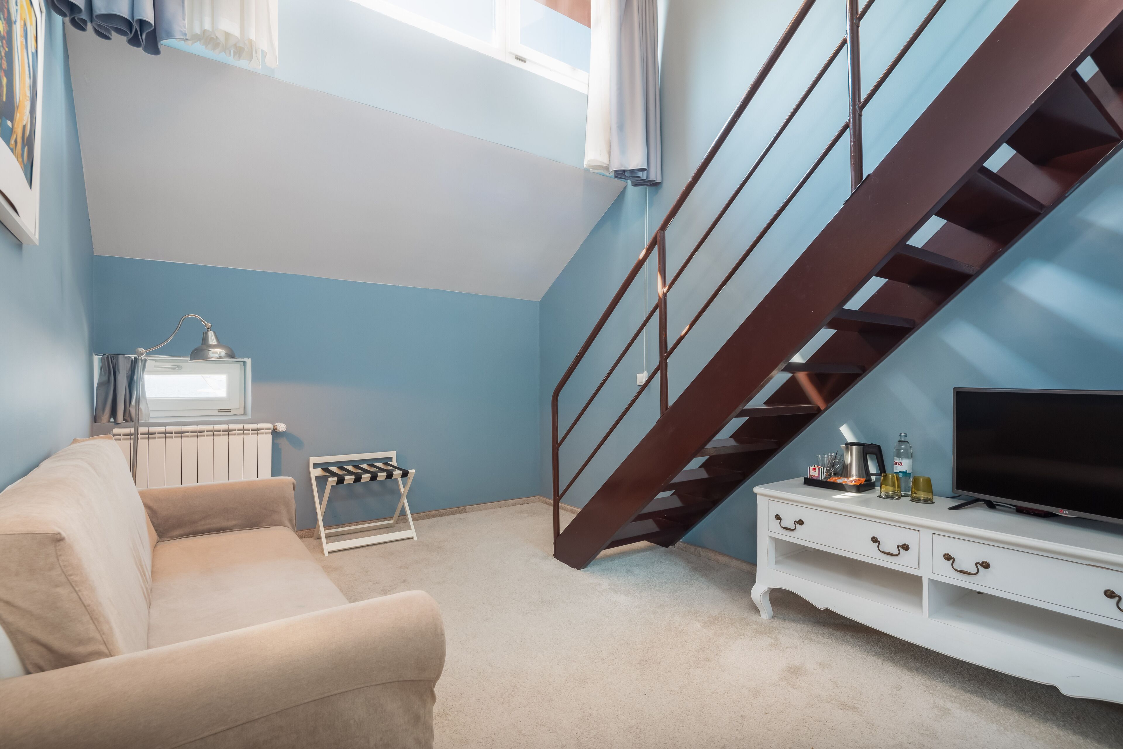 comfort suite | living area | 56-inch led tv with satellite channels, tv