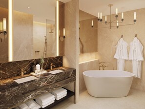 Regadera, amenidades de baño gratuitas, secadora de cabello, batas 