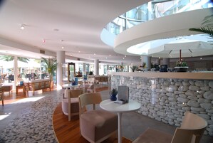 4 bars/lounges, poolside bar, beach bar