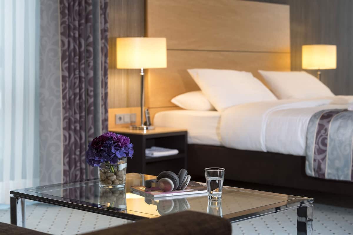 master suite | hypo-allergenic bedding, in-room safe, desk, soundproofing