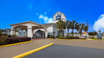 Welcome to Best Western, featuring a modern design and beautifully landscaped surroundings.